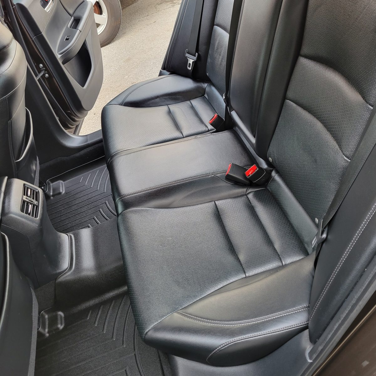 The same Honda Accord rear seat spotless after a full interior detail