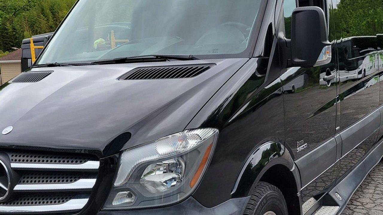 Professionally branded commercial van representing fleet wrap services near Glen Burnie